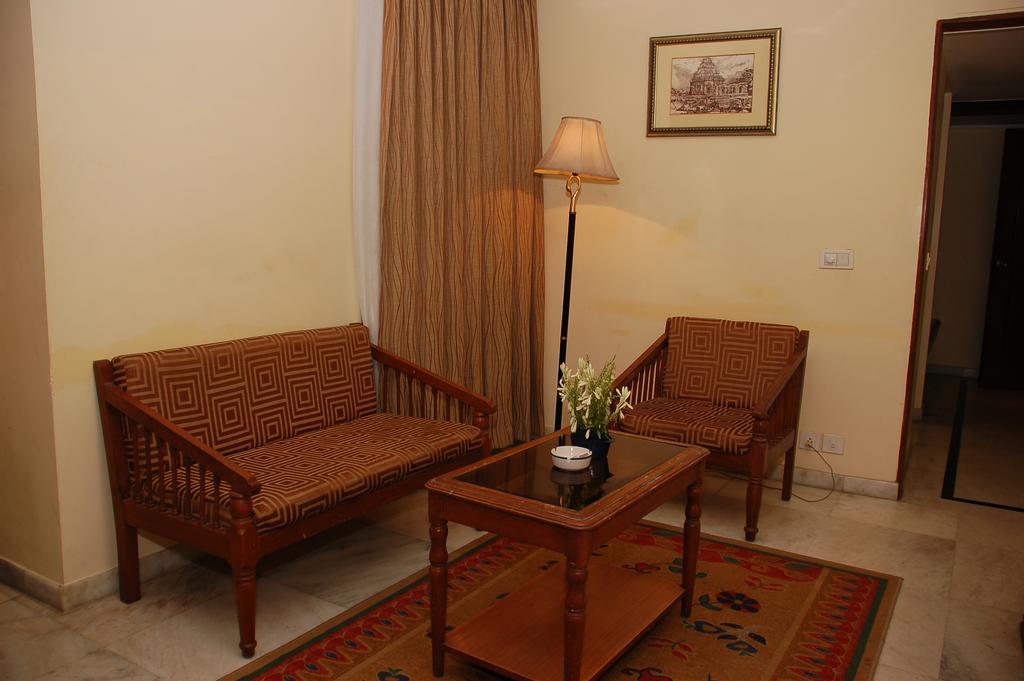 Hotel Royale Midtown Bhuvanesvar Szoba fotó